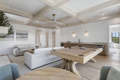 Experience refined coastal living in this newly built, fully