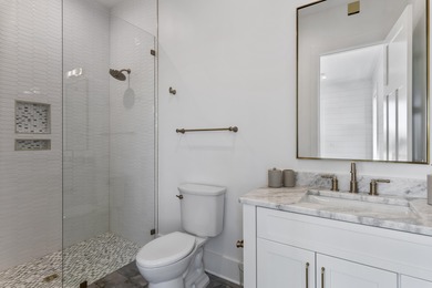 Experience refined coastal living in this newly built, fully