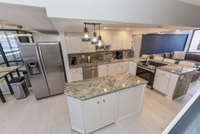 Location location!Beautiful remodeled  2 story penthouse with
