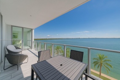 Experience breathtaking Biscayne Bay views from this 2 bed + den