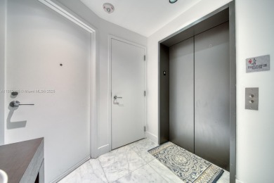 Experience breathtaking Biscayne Bay views from this 2 bed + den