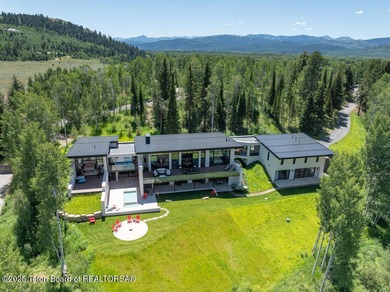 Experience the pinnacle of mountain modern living in this