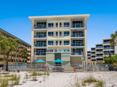 Welcome to luxurious, maintenance-free beachfront living at