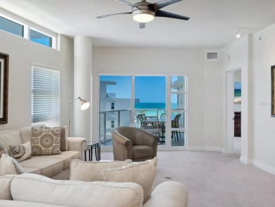 Welcome to luxurious, maintenance-free beachfront living at