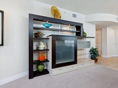 Welcome to luxurious, maintenance-free beachfront living at