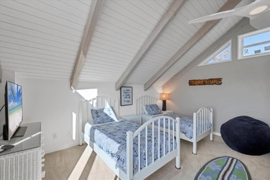 Steps from the pristine sand of the Gulf and one of three gulf