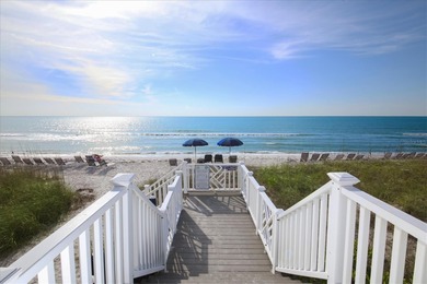 Steps from the pristine sand of the Gulf and one of three gulf