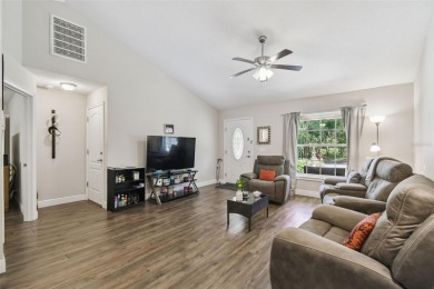 Tucked away on a VERY PRIVATE and SECLUDED .55-acre corner lot