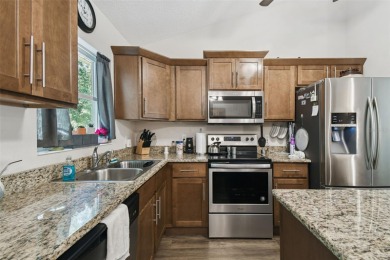 Tucked away on a VERY PRIVATE and SECLUDED .55-acre corner lot