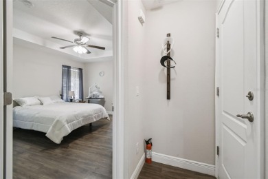 Tucked away on a VERY PRIVATE and SECLUDED .55-acre corner lot