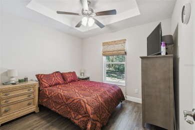 Tucked away on a VERY PRIVATE and SECLUDED .55-acre corner lot