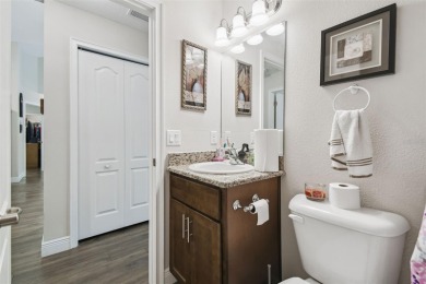 Tucked away on a VERY PRIVATE and SECLUDED .55-acre corner lot