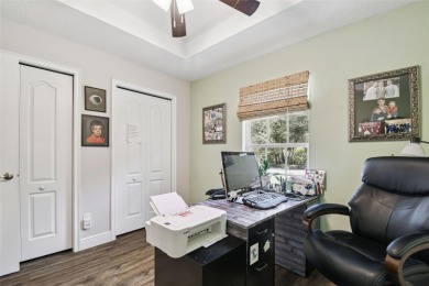 Tucked away on a VERY PRIVATE and SECLUDED .55-acre corner lot