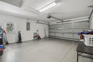 Tucked away on a VERY PRIVATE and SECLUDED .55-acre corner lot