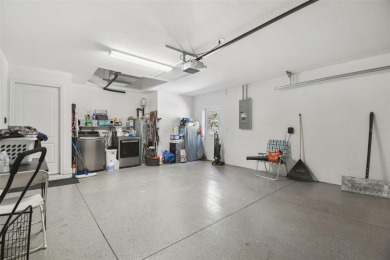 Tucked away on a VERY PRIVATE and SECLUDED .55-acre corner lot