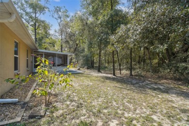 Tucked away on a VERY PRIVATE and SECLUDED .55-acre corner lot