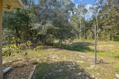 Tucked away on a VERY PRIVATE and SECLUDED .55-acre corner lot