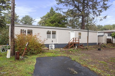 This charming 2 bedroom 1 bath coastal retreat located in the