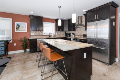 BEACH BLOCK UPSCALE CONDO WITH OCEAN VIEWS & ROOF TOP POOL! The