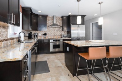 BEACH BLOCK UPSCALE CONDO WITH OCEAN VIEWS & ROOF TOP POOL! The