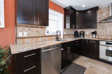 BEACH BLOCK UPSCALE CONDO WITH OCEAN VIEWS & ROOF TOP POOL! The