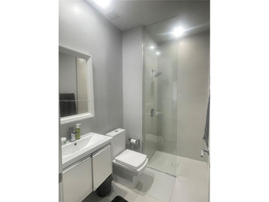 LUXURY LANDMARK DORAL, THIS STUNNING 4-STORY TOWNHOUSE! BOASTING