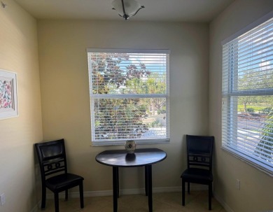 *FURNISHED END UNIT plus a DEN with WATER & GOLF COURSE VIEWS!