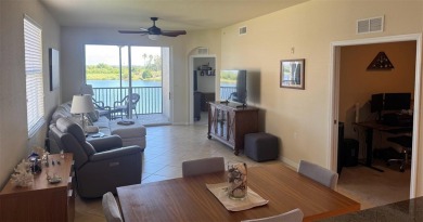 *FURNISHED END UNIT plus a DEN with WATER & GOLF COURSE VIEWS!