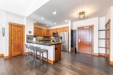 Experience elevated Northstar Village living from this freshly