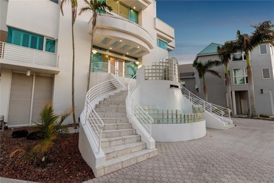 Located in the private, gated enclave of Esplanade on the Bay