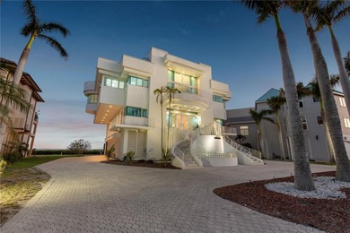Located in the private, gated enclave of Esplanade on the Bay