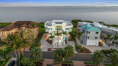 Located in the private, gated enclave of Esplanade on the Bay