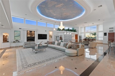 Located in the private, gated enclave of Esplanade on the Bay