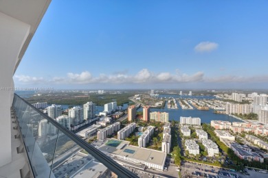 Welcome to Sky Villa 5105 at Jade Signature, a rare two-story