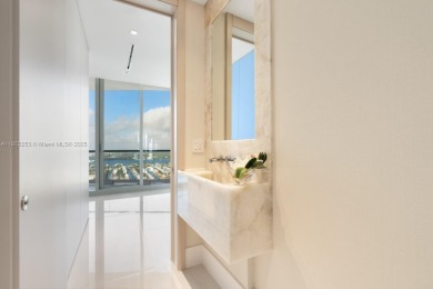 Welcome to Sky Villa 5105 at Jade Signature, a rare two-story