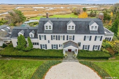 Located on a quiet cul-de-sac, this magnificent waterfront