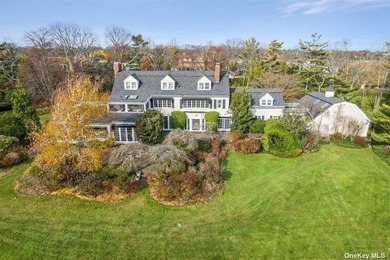 Located on a quiet cul-de-sac, this magnificent waterfront