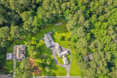 This beautifully remodeled home is set on a serene 3.52-acre