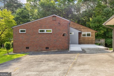 This beautifully remodeled home is set on a serene 3.52-acre
