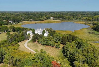 Discover elegance and quality on this stunning 14.4-acre estate