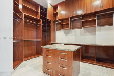 Welcome to a modern Pinecrest masterpiece! This 9,912-sq-ft home