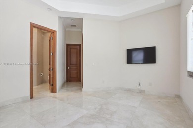 Welcome to a modern Pinecrest masterpiece! This 9,912-sq-ft home