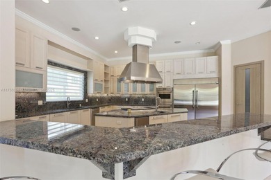 Welcome to a modern Pinecrest masterpiece! This 9,912-sq-ft home