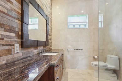 Welcome to a modern Pinecrest masterpiece! This 9,912-sq-ft home