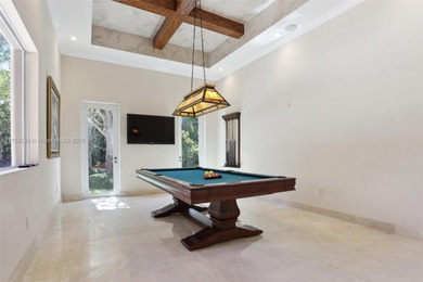 Welcome to a modern Pinecrest masterpiece! This 9,912-sq-ft home