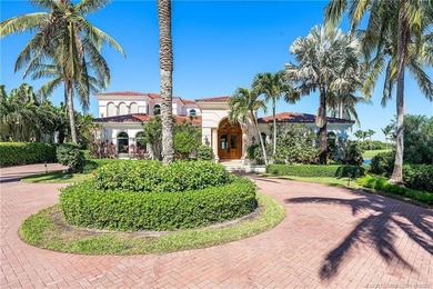 Water, water everywhere! This stunning Sailfish Point residence