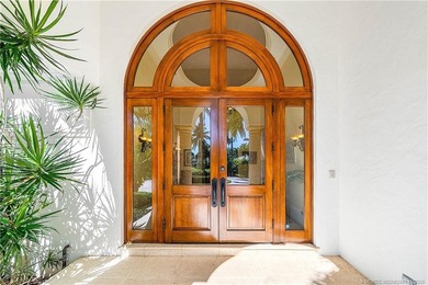 Water, water everywhere! This stunning Sailfish Point residence