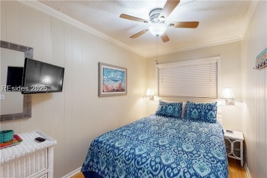 Turnkey coastal retreat just steps from the beach! This