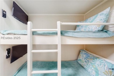 Turnkey coastal retreat just steps from the beach! This