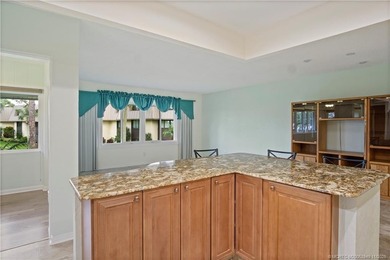 This light and bright second floor condo is in an elevator